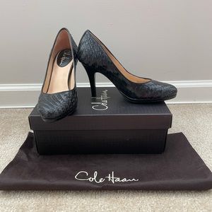 Cole Haan Genevieve Nike Air Pump 
Black Leather weave 
3.5 in heels 
Size 7